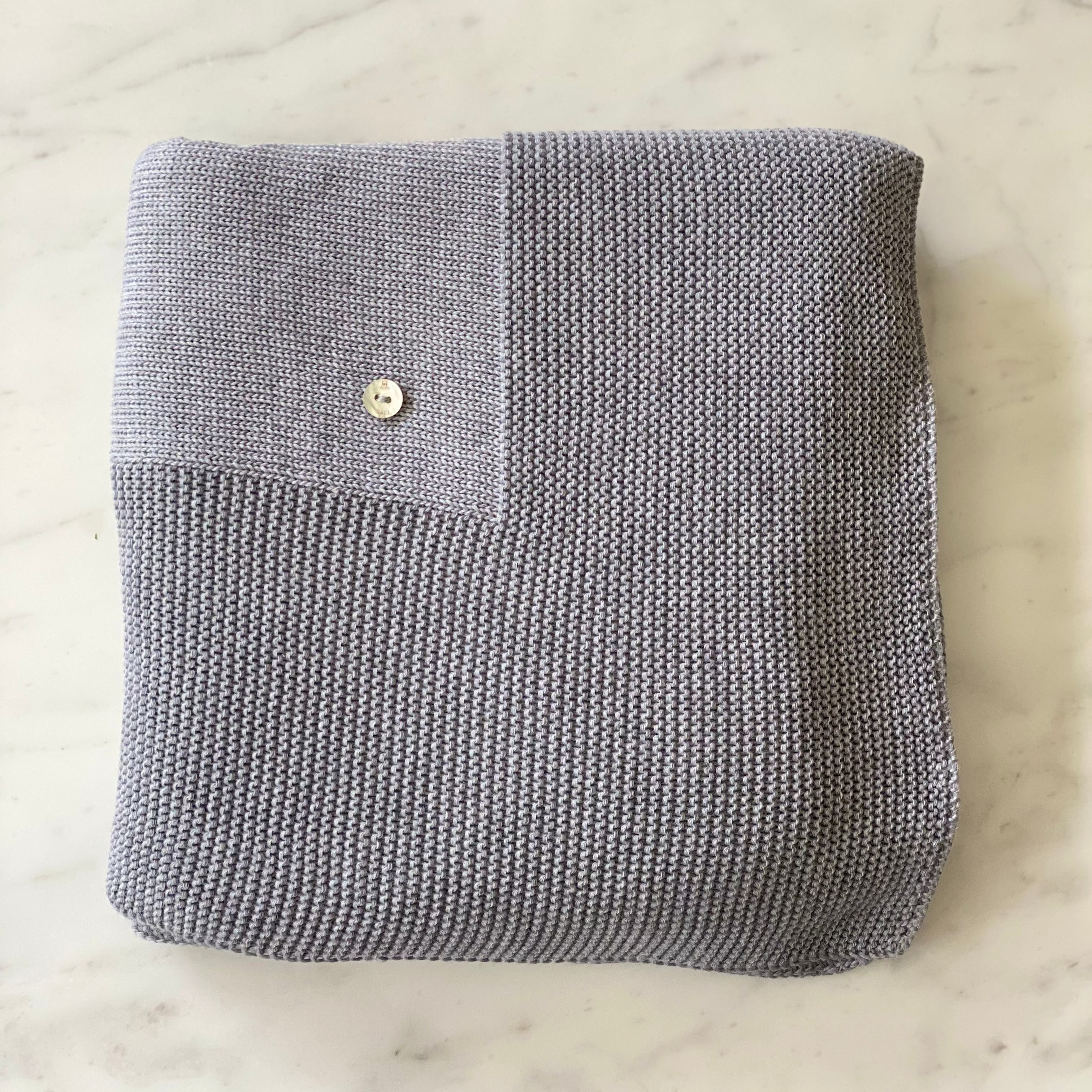 Cobija waffle gris y arena