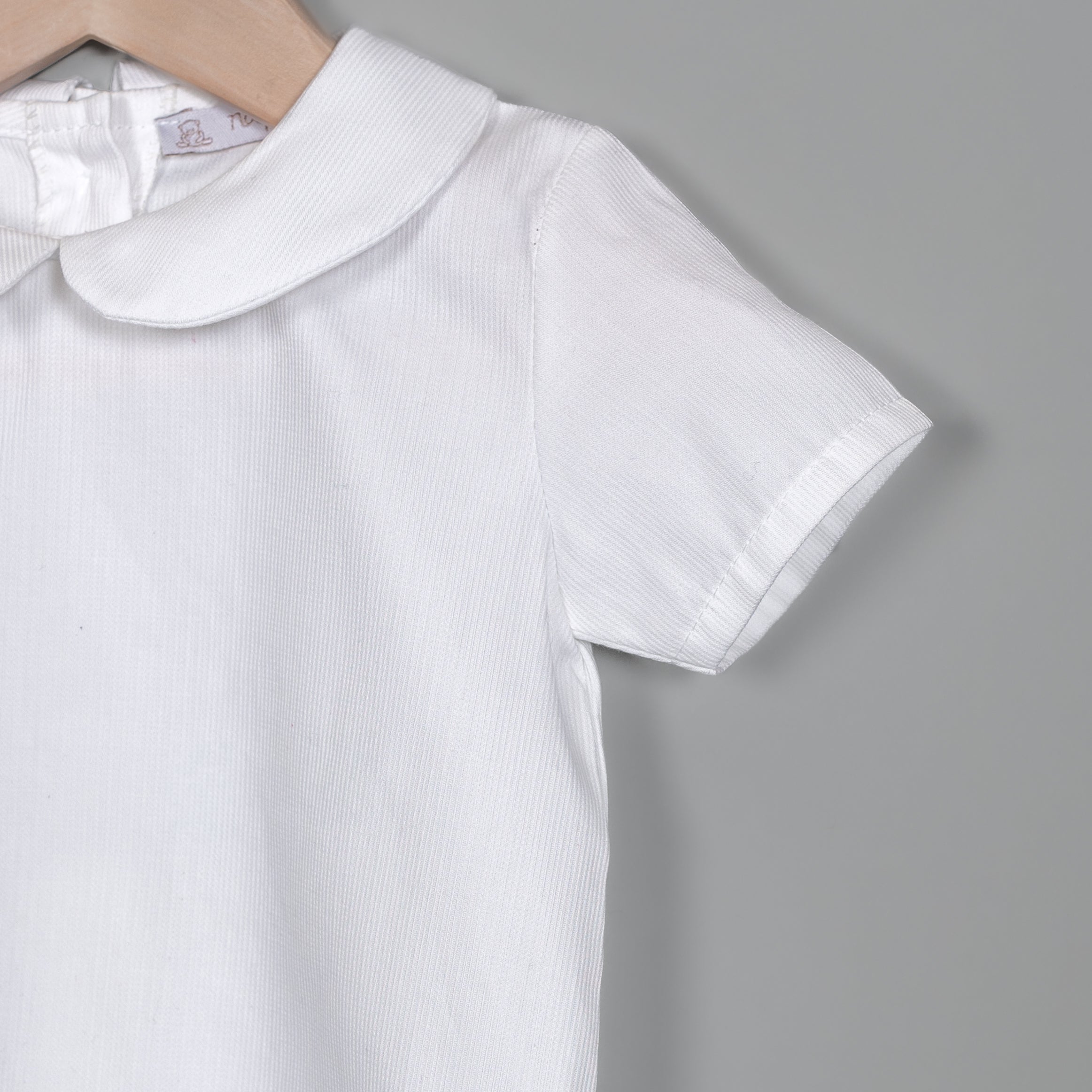 Camisa de pique para bebé manga corta
