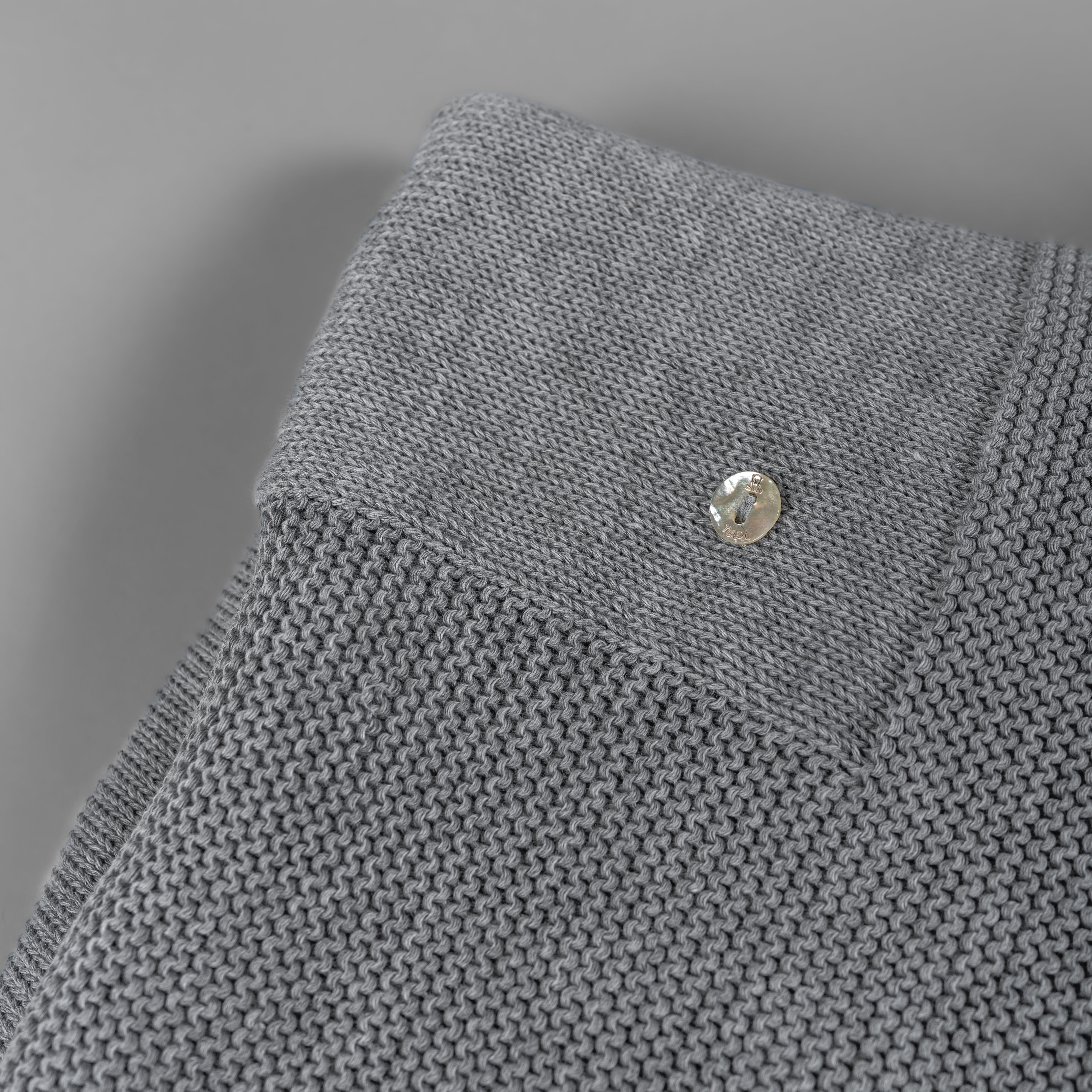 Cobija waffle gris y arena