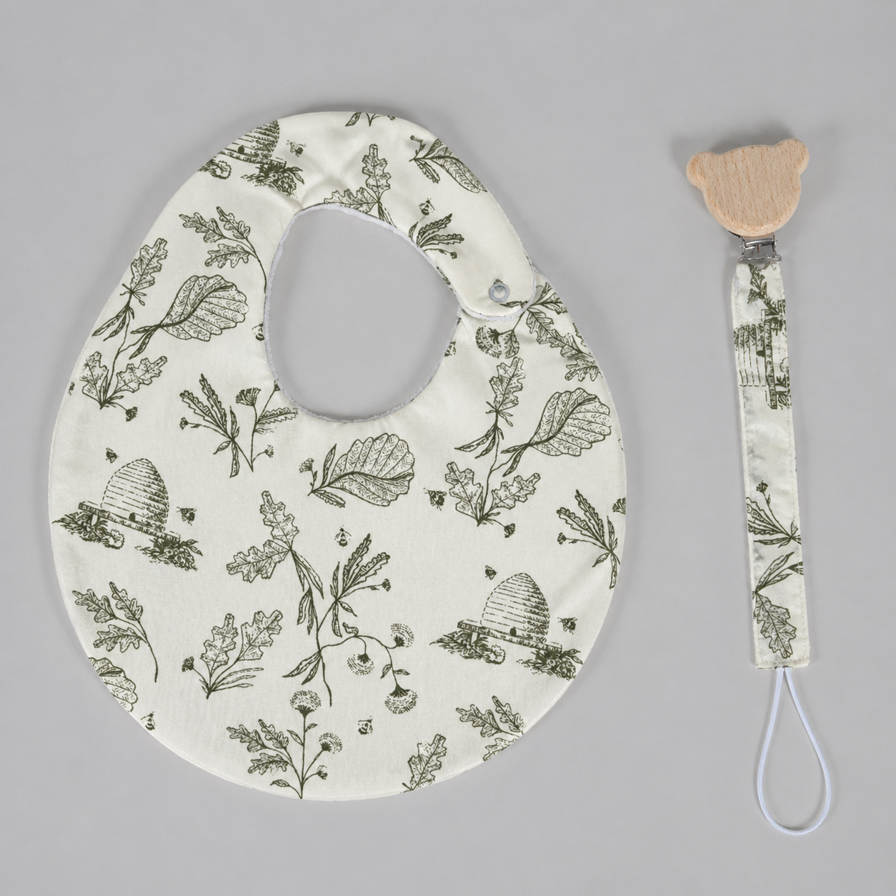 Set babero & portachupon abejas verde (impermeable)