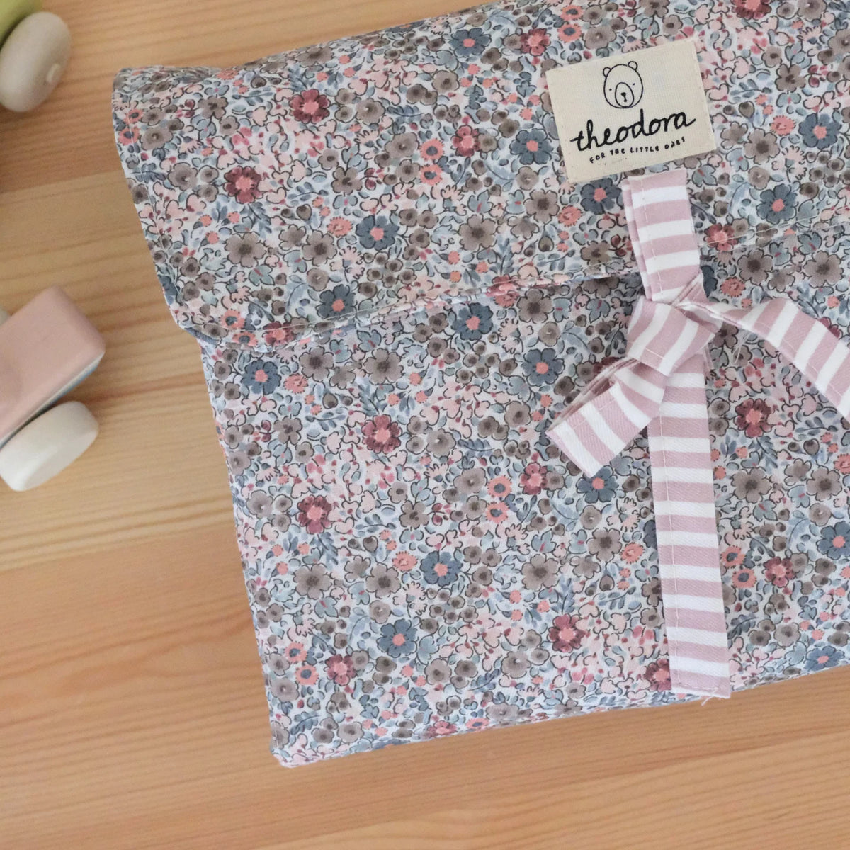 Cambiador flores y rayas dusty pink