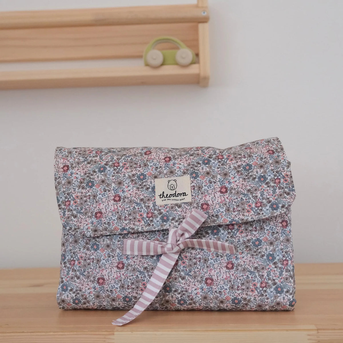Cambiador flores y rayas dusty pink