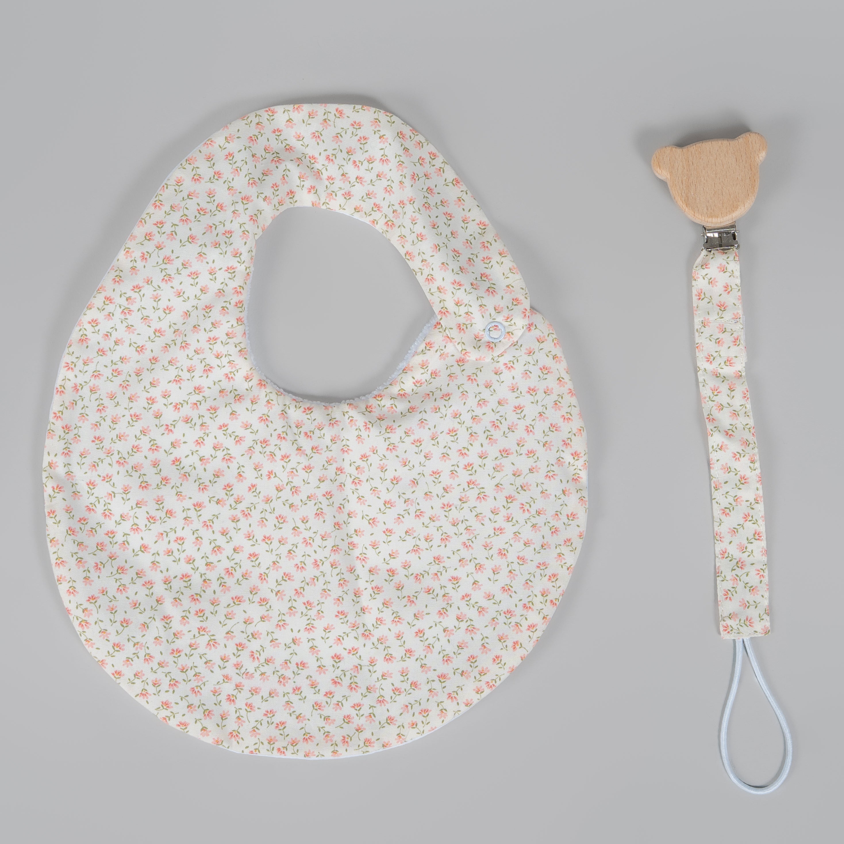 Set babero & portachupon flores