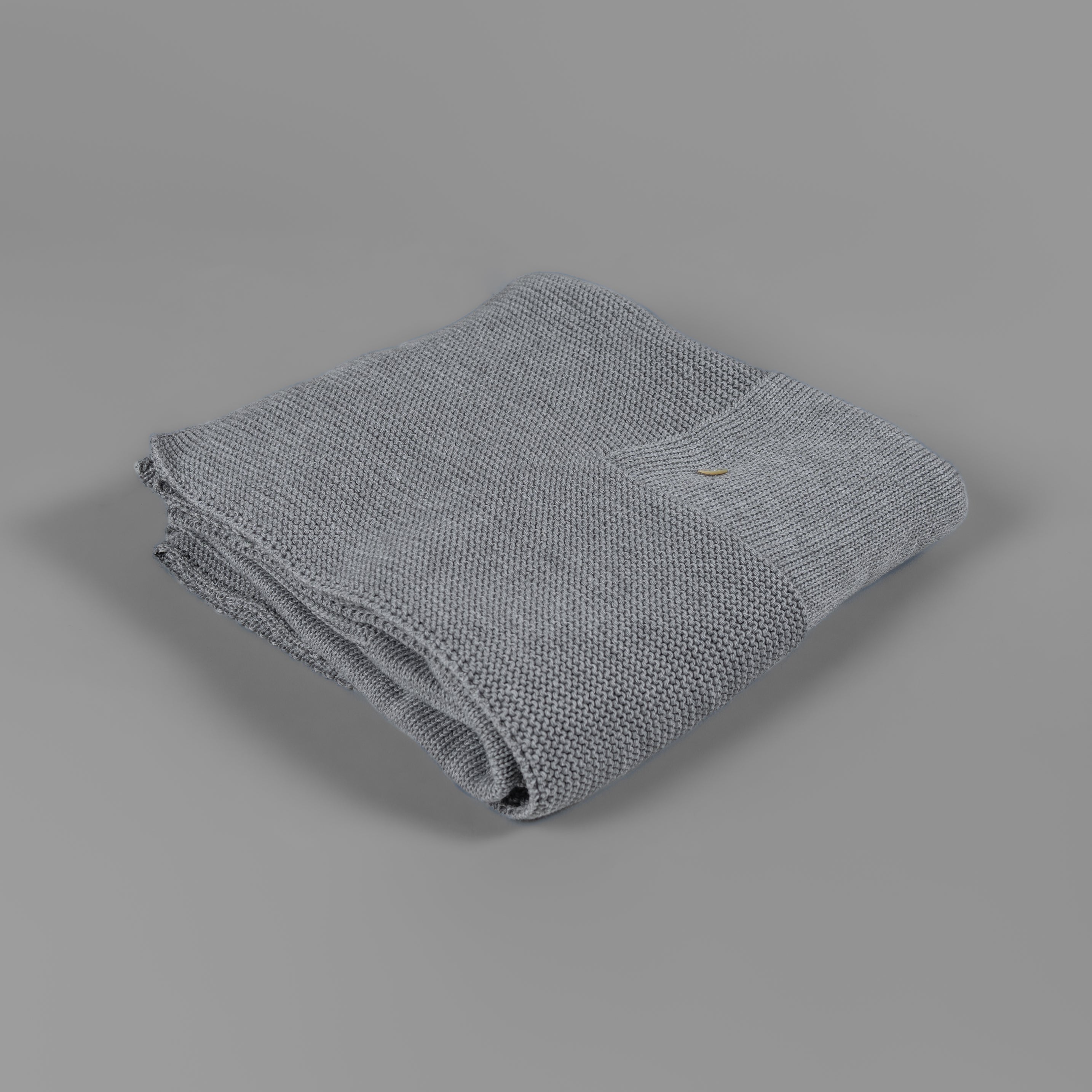 Cobija waffle gris y arena