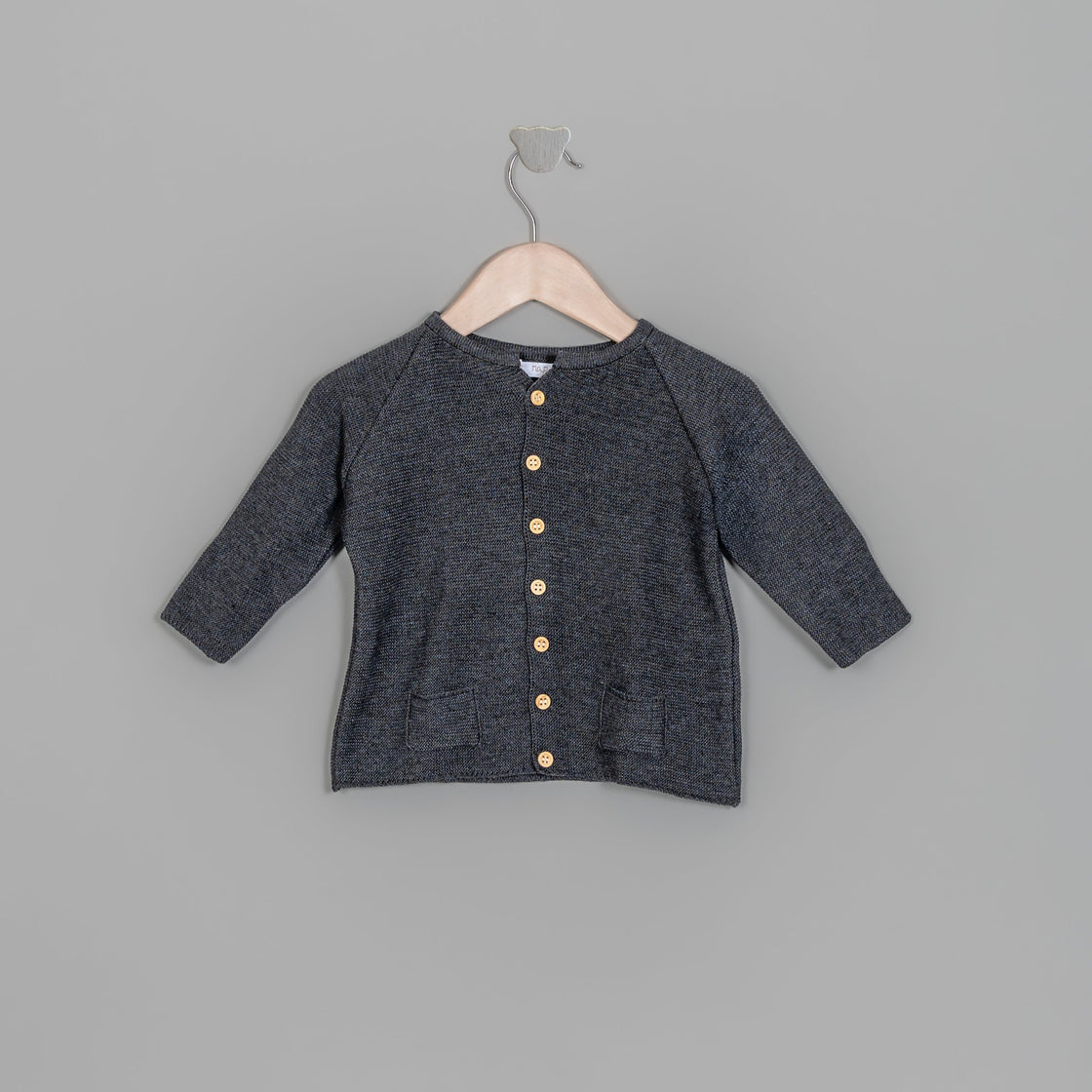 Suéter bolsitas gris oxford